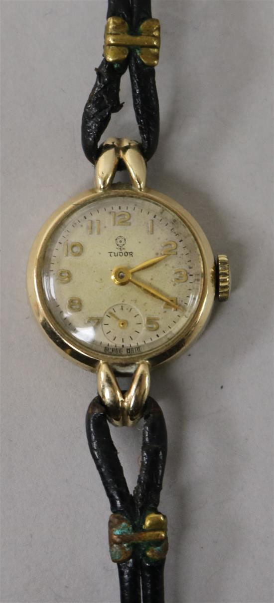 A ladys 9ct gold Tudor manual wind wrist watch.